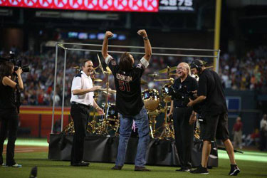 Baseball Hall of Famer Randy Johnson Receives a Replica Neil Peart R30 Drum Kit at Jersey Retirement Ceremony